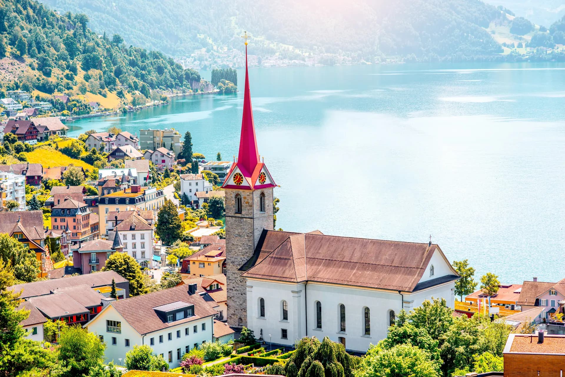 Church on Lake Lucerne with Swiss mountain panorama