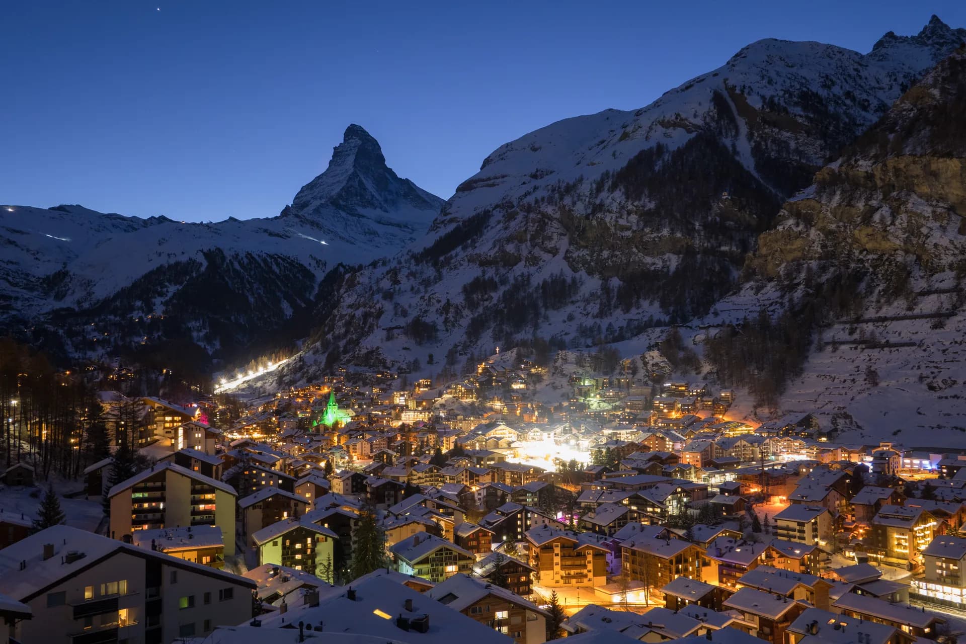 Zermatt village with Matterhorn peak at dawn in winter